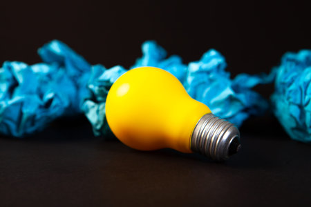 light bulbs on black background, concept of innovation