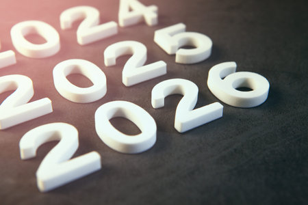 New year 2020 concept. White numbers on black background. Vintage toned