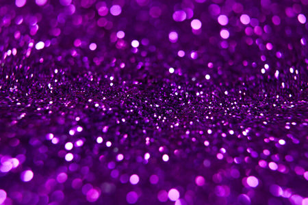 purple glitter abstract background. defocused lights bokeh