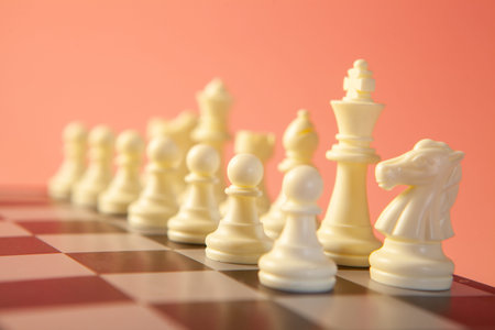 Chess pieces on a chessboard, close-up, selective focus
