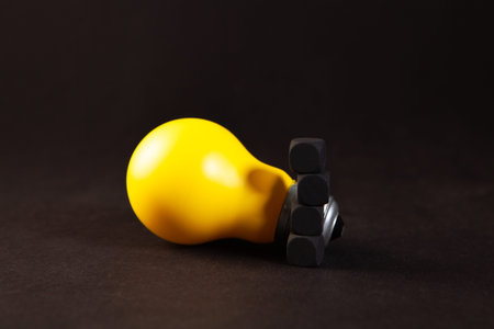 black and white dumbbells on the dark background.