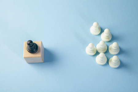 White chess pieces on a blue background. The concept of the game of chess.