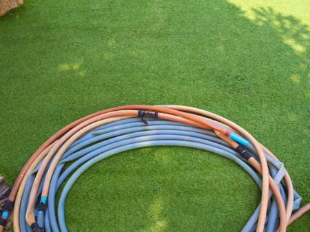 Rubber tube on Artificial grass