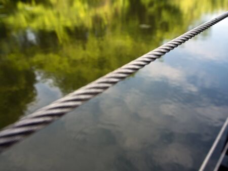 Fence wire on waterfront terrace