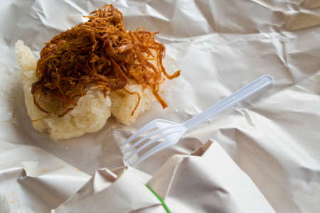 Sticky rice and Roast pork in paper wrapの写真素材