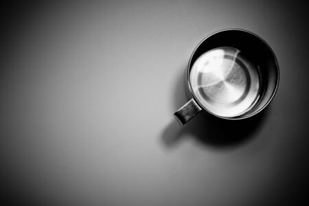 Drink water in a stainless steel cupの写真素材