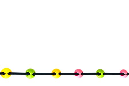 Yellow, Green and Pink the Colorful wall stick wire clipの写真素材