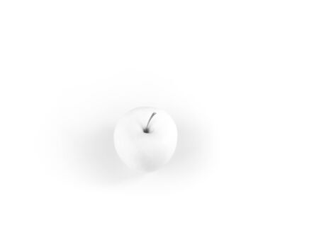 White apple on white backgroundの写真素材
