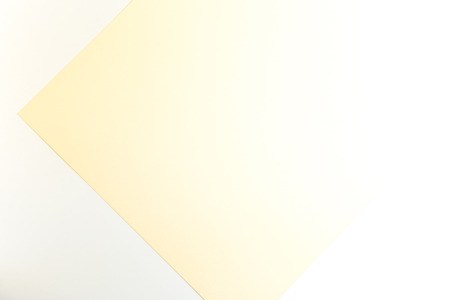 Blank white paper sheet on white backgroundの写真素材