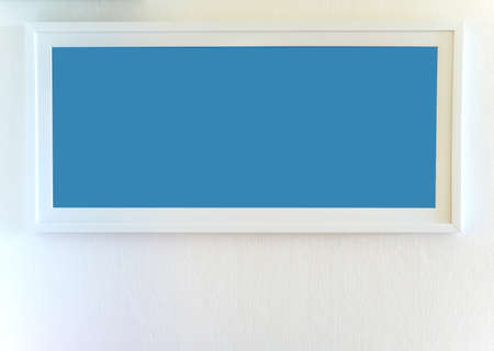 The white blank panoramic picture frame on white wallの写真素材