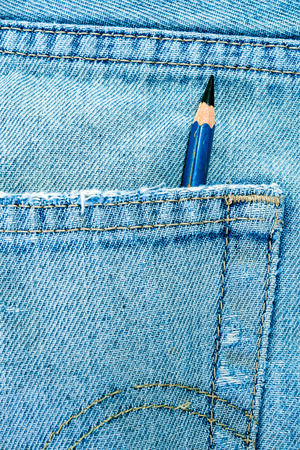 EE type Pencil in the pocket of denim blue jeanの写真素材