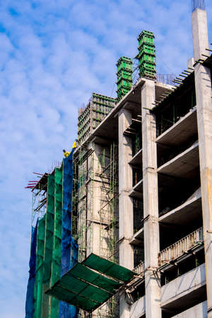 The high-rise building under constructionの写真素材