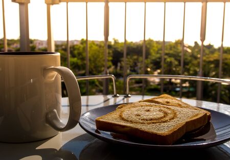 Breakfast with morning light at the balconyの写真素材