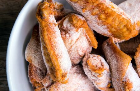 Some pieces of frozen chicken wings prepare for cookの写真素材