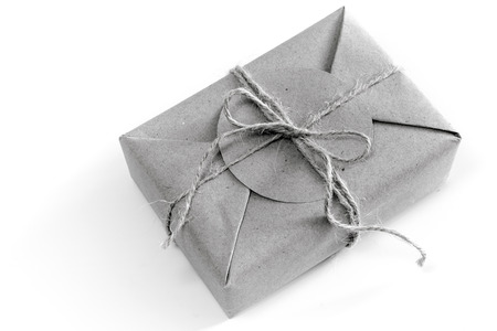 Gift box wrapped in kraft paper and rustic hemp cord as natural rustic styleの写真素材