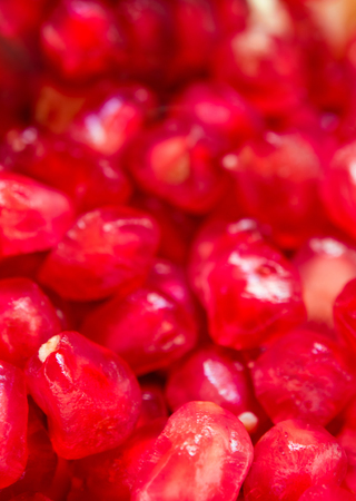 Closeup image of full frame background of Pomegranate seeds as fruit backgroundの写真素材