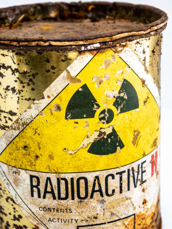 Radiation warning sign on transport index label stick on the rust and decay radioactive material...