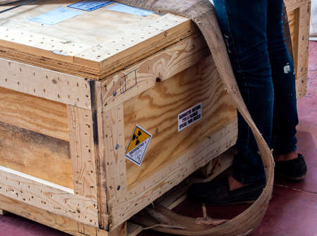Radioactive material label beside the transportation wooden box Type A standard package