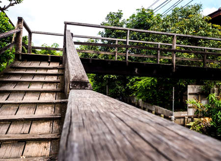 wooden bridge across the drainage canal