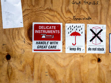 warning label beside transportation wooden boxの写真素材
