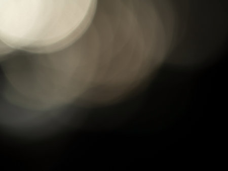 Blurred background of Bokeh lights in the darkの写真素材