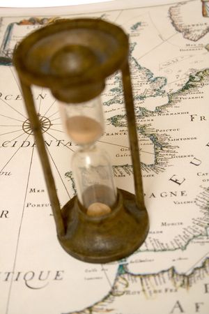 old glass colcks over antique map