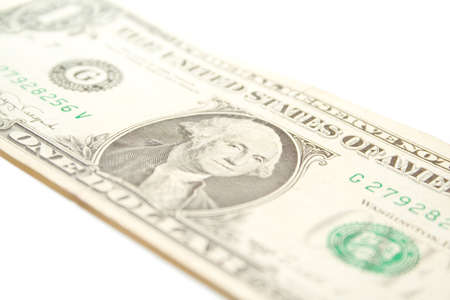 crumpled one dollar on whitle isolated background