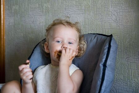  eat chocolate cake on kitchenの写真素材