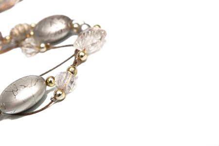 grey jewelry isolated on whiteの写真素材