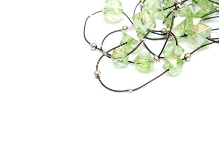 green stone jewels isolated on whiteの写真素材