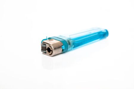 blue cigarette lighter isolated on whiteの写真素材