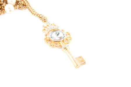 Gold Skeleton Key isolated on white backgroundの写真素材