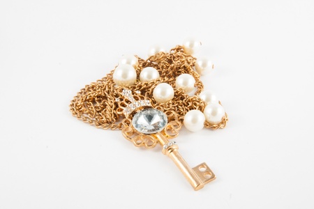 Gold Skeleton Key isolated on white backgroundの写真素材