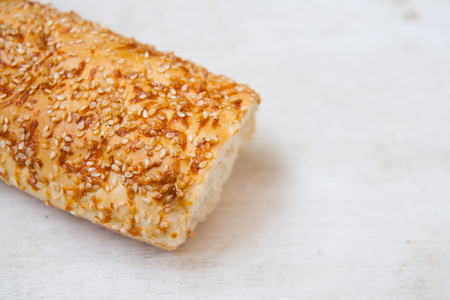 fresh bread on old wooden table ofの写真素材