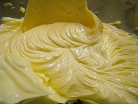 melt butter in the bowl make some incredible texture from food mixer machine.の写真素材