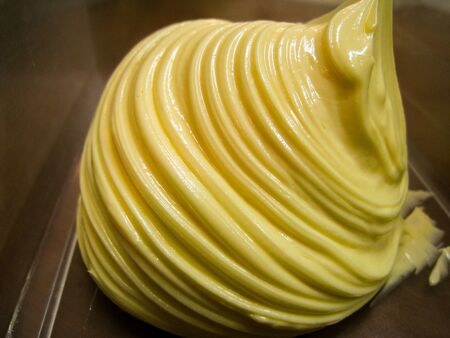 melt butter in the bowl make some incredible texture from food mixer machine.の写真素材