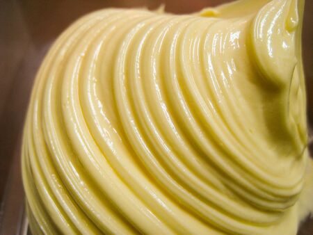 melt butter in the bowl make some incredible texture from food mixer machine.の写真素材