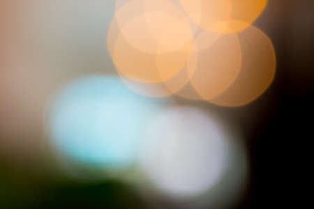 bokeh of light on out of focus picture in dark background.