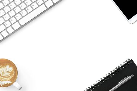 White modern office desk table with supplies and latte coffee. Top view with copy space, flat lay.の写真素材