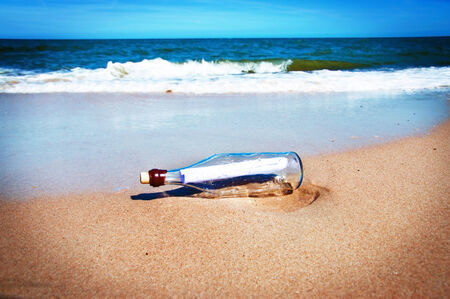 Bottle with a message at Beachの写真素材