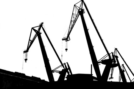 Industrial conceptual image. Black contours of industrial  cranes.の写真素材