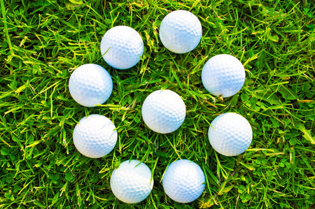 Golf game. Golf balls in grass.の写真素材