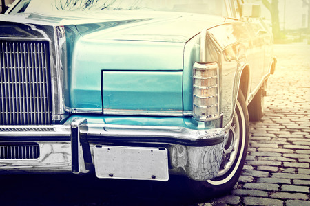 Retro vintage car parked in old city street. Retro vintage picture.の写真素材