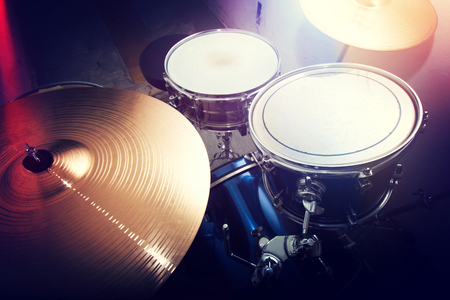 Drums conceptual image. Picture of drums and drumsticks lying on snare drum.の写真素材