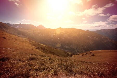 Mountains Landscape. Bright summer sun in mountains.の写真素材