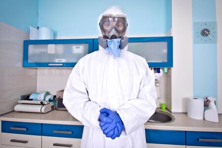 Doctor in protective suit uniform and mask. Coronavirus outbreak. Covid-19 concept.の写真素材