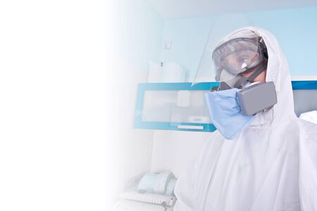 Doctor in protective suit uniform and mask. Coronavirus outbreak. Covid-19 concept.の写真素材