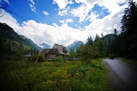 Old wooden house in beautiful mountains scenery.の写真素材