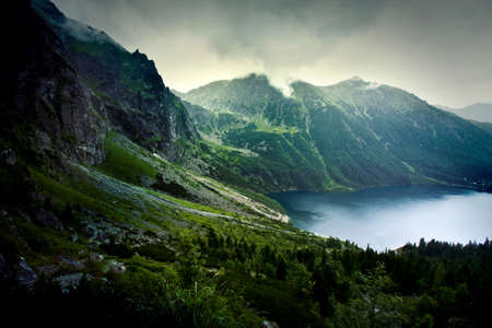 Lake in mountains. Fantasy and colorfull nature landscape.の写真素材