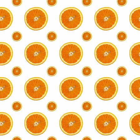 Creative pattern made of orange on white backgroundの写真素材